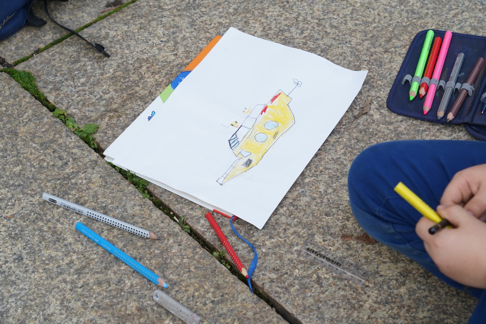 Child's coloured-pencil drawing of the yellow submarine in a sketchbook